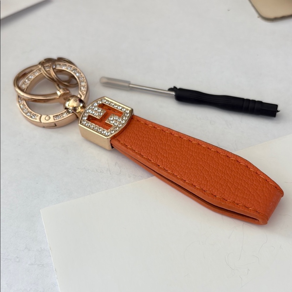 Orange Leather Keychain with Gold Accents
